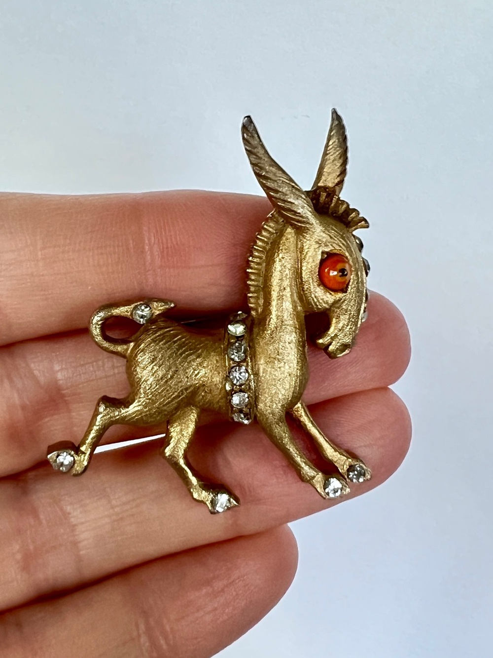 Vintage Weiss Donkey Brooch Signed Brushed Gold Tone Rhinestones and Orange Eye
